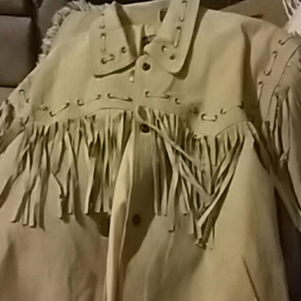Women's tan leather jacket with fringes